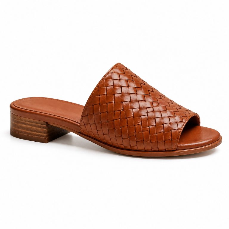 The Woven Slide Mule in Hand-Woven Cognac Italian Leather